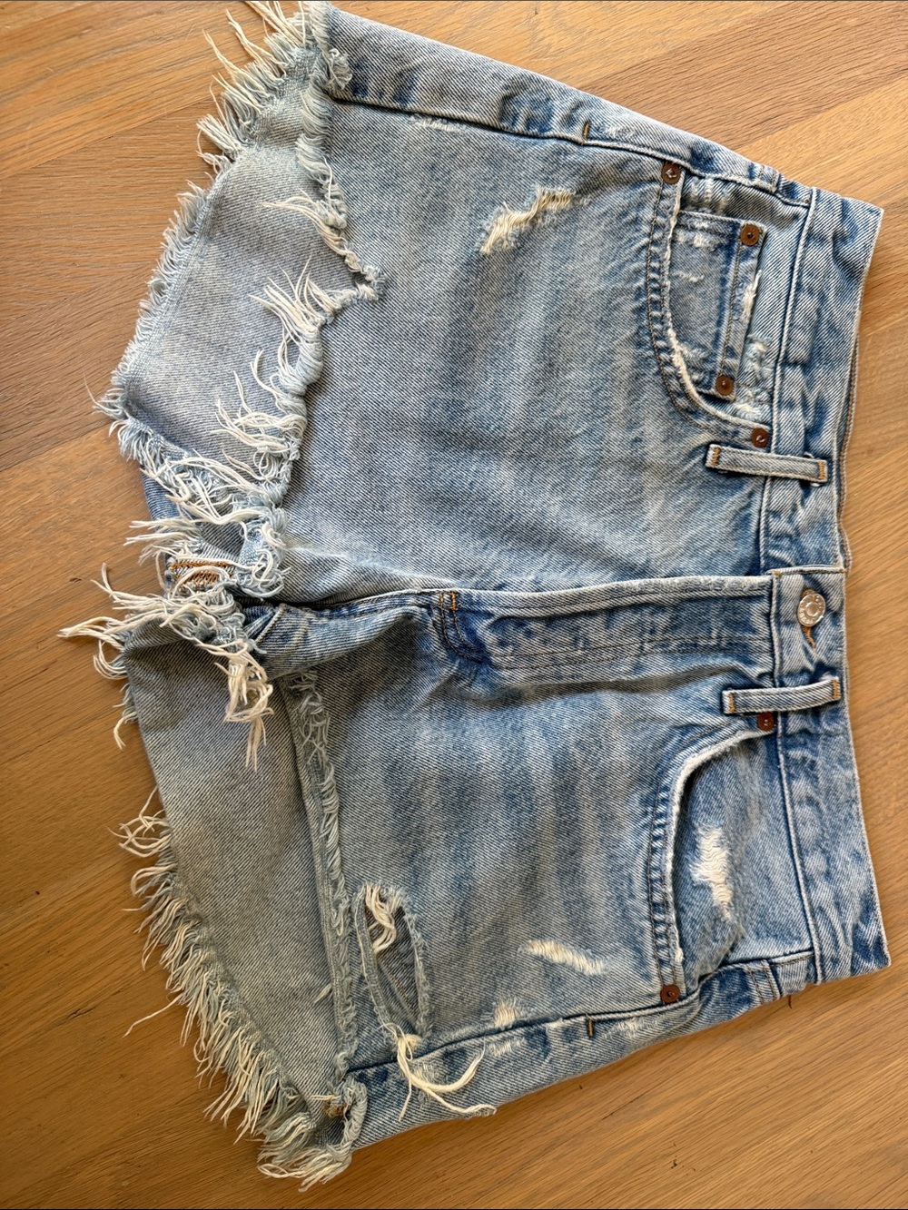 Agolde Light Blue Distressed Denim Cutoff Shorts